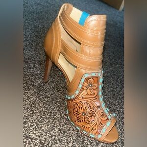 Customer western Michael Kors tooled leather heels